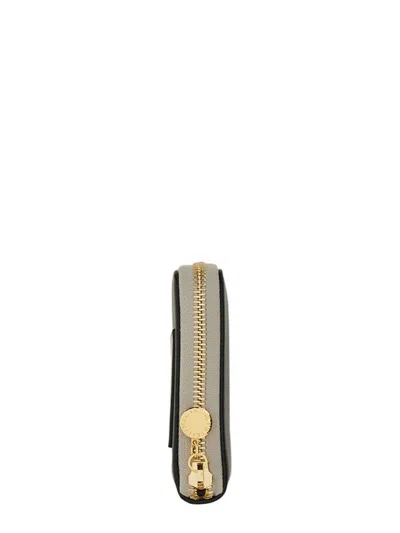 Stella Mccartney Zipped Wallet With Circular Logo And Gold Hardware