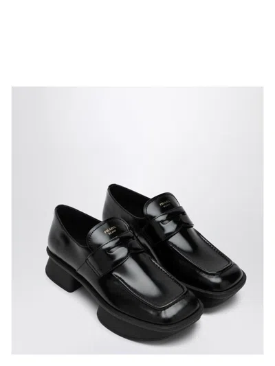 Prada Re-edition Equal Platform Penny Loafer In Black