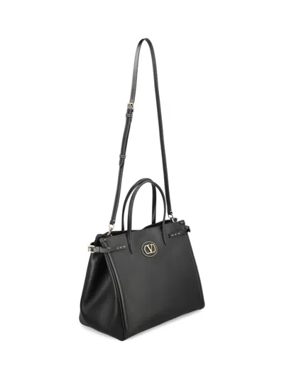 Valentino Garavani Borsa Tote In Pelle Nera Con Manici E Tracolla Women