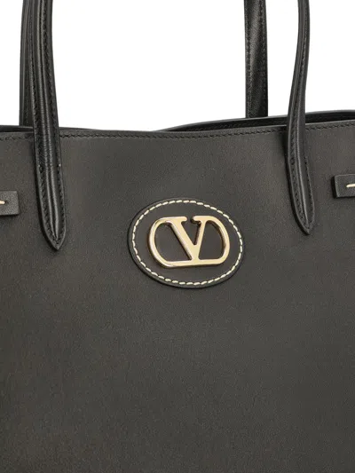 Valentino Garavani Borsa Tote In Pelle Nera Con Manici E Tracolla Women