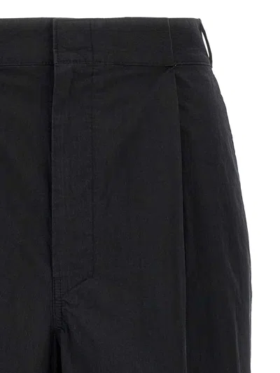 Maison Margiela Four-stitch Logo Palazzo Trousers In Black