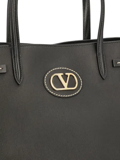 Valentino Garavani Borsa Tote In Pelle Nera Con Manici E Tracolla Women