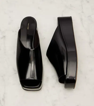 The Row 20mm Emi Flatform Patent Leather Wedges In Black