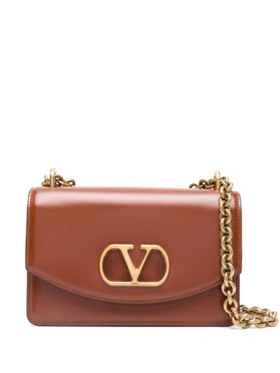 Valentino Garavani Shiny Leather Small Shoulder Bag In Brown