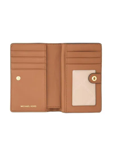 Michael Kors Textured Leather Fold-over Wallet In Brown