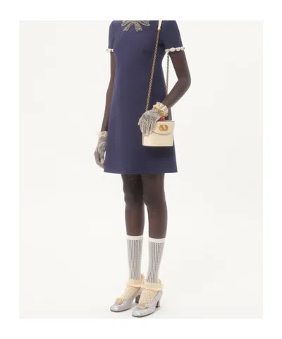 Valentino Garavani Ivory Leather Vlogo Signature Bucket Bag In Neutral