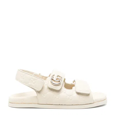 Gucci Gg Embossed Strap Sandals In Neutral