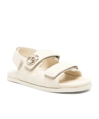 Gucci Gg Embossed Strap Sandals In Neutral
