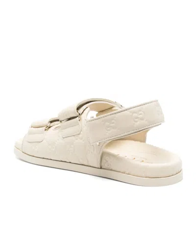 Gucci Gg Embossed Strap Sandals In Neutral
