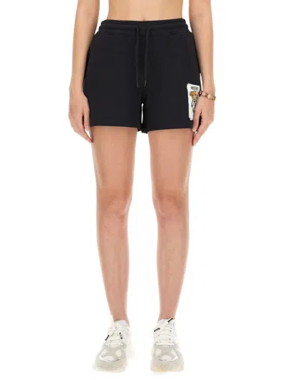 Shop Moschino Cotton Sweatshirt Shorts With Playful Graphic
