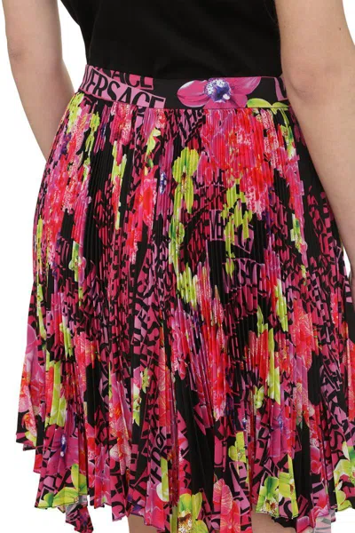 Versace Multicolor Asymmetric Pleated Mini-skirt With Logo Orchid Print In Polyester Woman