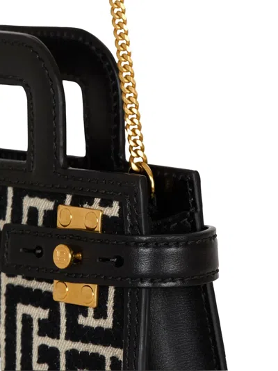 Balmain B-buzz Small Top Handle Monogrammed Canvas And Leather Bag In Black