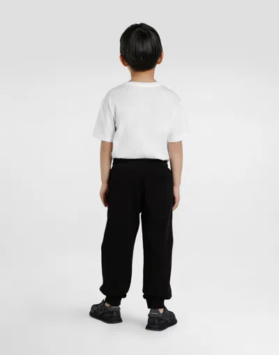 Dolce & Gabbana Short-sleeved T-shirt With Embossed Dg Majolica-print Logo