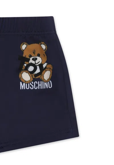 Moschino Blue Swimsuit For Babt Boy With Teddy Bear And White Logo