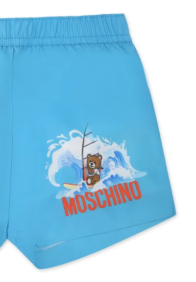 Moschino Light Blue Swimsuit Shorts For Baby Boy With Teddy Bear And Logo