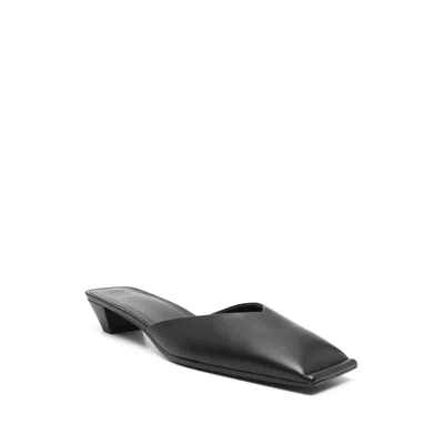 Carven Mules