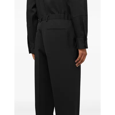 Jil Sander Wool Logo Cuffed Trousers In Black
