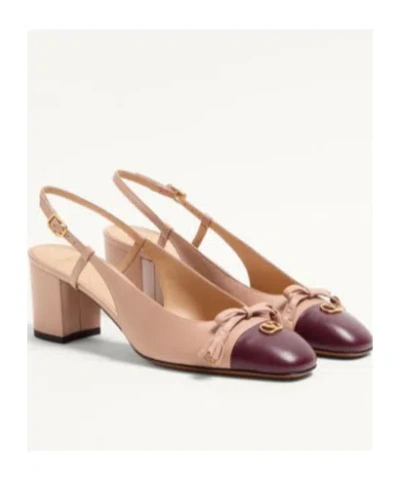 Valentino Garavani Valet Du Roi Tasseled Bow-embellished Two-tone Leather Pumps In Neutral