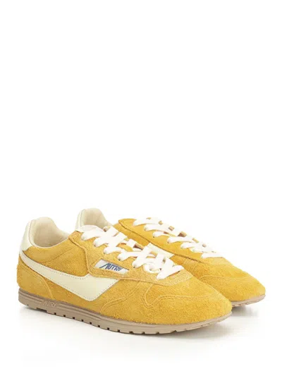 Autry 'windspin Low' Yellow Sneaker With Logo On The Side And On The Heel