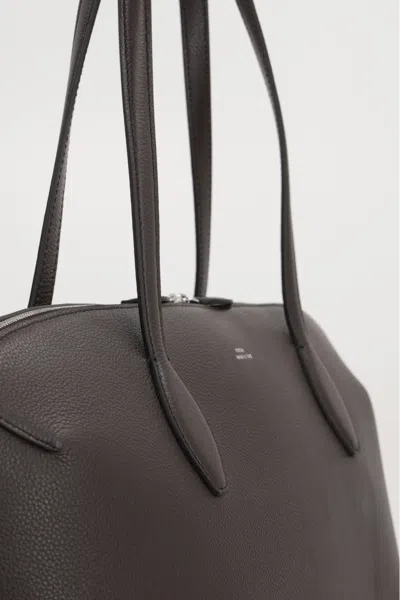 Totême Leather Handbag With Engraved Logo On The Front In Brown