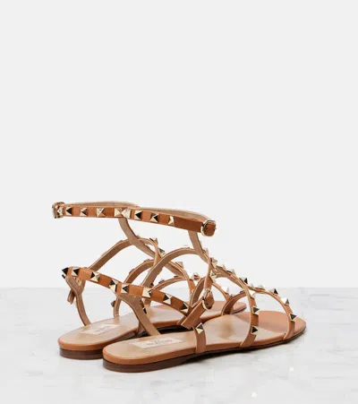 Valentino Garavani Valentino Rockstud Caged Leather Ankle Strap Sandal In Beige