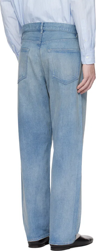 Auralee Light Indigo Jeans With Washed Effect