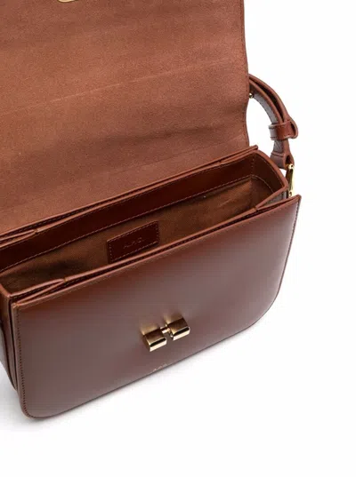 Apc Grance Brown Small Crossbody Bag Wirh Embossed Logo Lettering On The Front And Adjustable Shoulder S