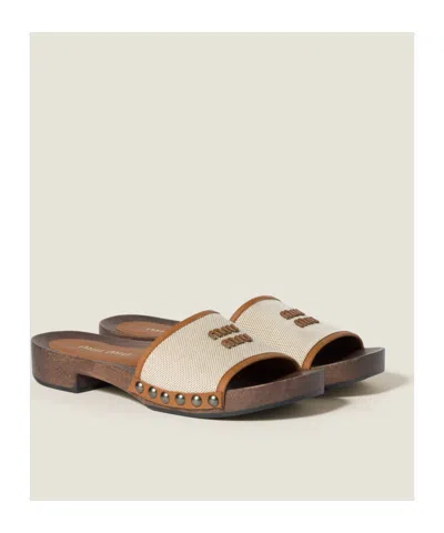 Miu Miu Canvas And Leather Studded Clog Sandals In Neutral
