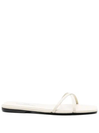 Totême Leather Crossover Slides Off-white