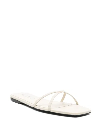 Totême Leather Crossover Slides Off-white