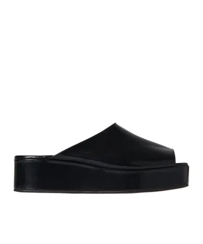 The Row 20mm Emi Flatform Patent Leather Wedges In Black