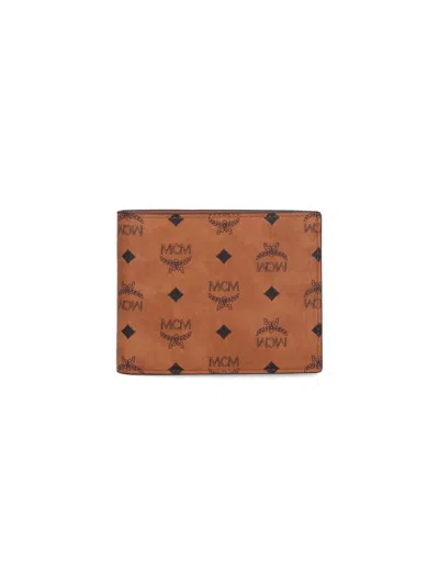 Mcm Printed Canvas Wallet In Brown