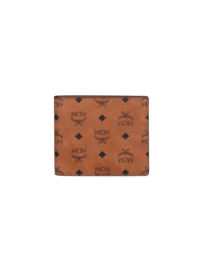 Mcm Printed Canvas Wallet In Brown