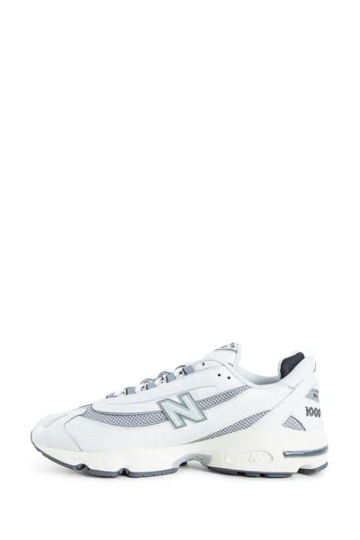 New Balance Grey Low Top Sneakers With Logo Patch On Side And Tongue And Perforated Panels