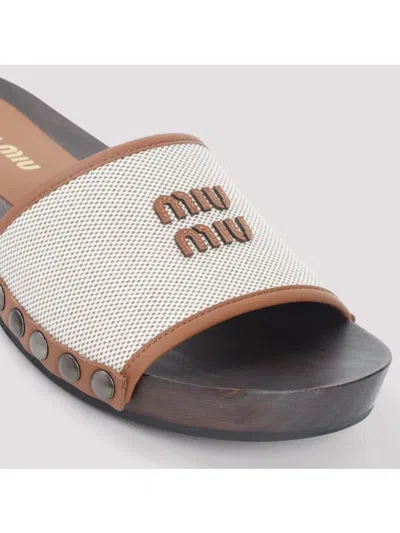 Miu Miu Canvas And Leather Studded Clog Sandals In Neutral