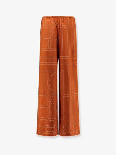 Totême Toteme Women Monogram Silk Pajama Pants In Orange