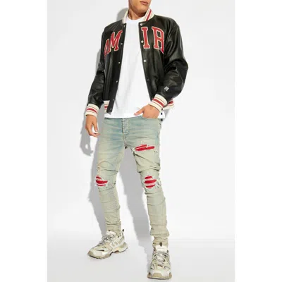 Amiri Mx1 Slim Fit Jeans With Distressed Red Accents