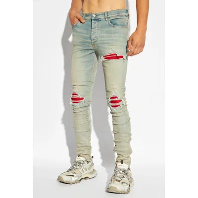 Amiri Mx1 Slim Fit Jeans With Distressed Red Accents