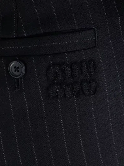 Miu Miu Trousers With Back Pockets And Button Detail