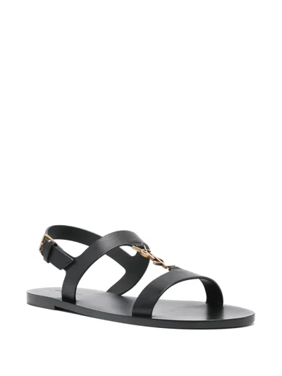 Saint Laurent Cassandra Logo Plaque Flat Sandals In Black