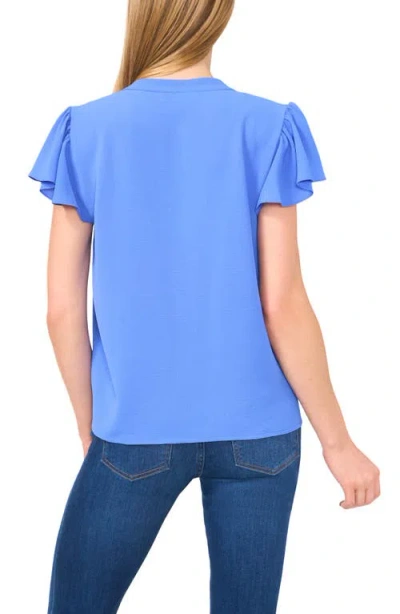 Cece Split Neck Flutter Sleeve Top In Blue