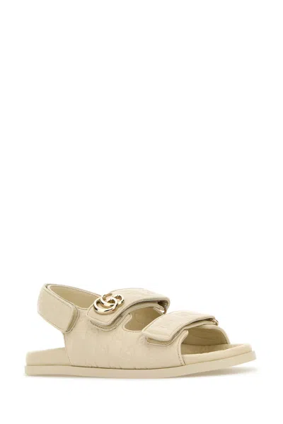 Gucci Gg Embossed Strap Sandals In Neutral