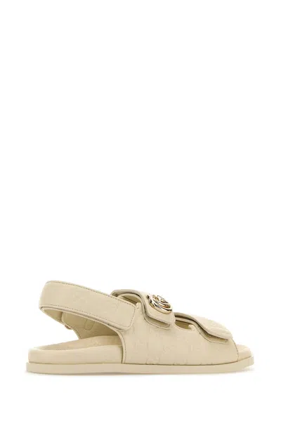 Gucci Gg Embossed Strap Sandals In Neutral