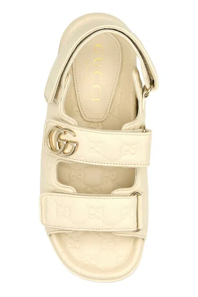 Gucci Gg Embossed Strap Sandals In Neutral