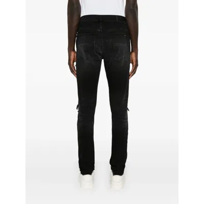 Amiri Stretch Denim Jeans Distressed Detailing In Black