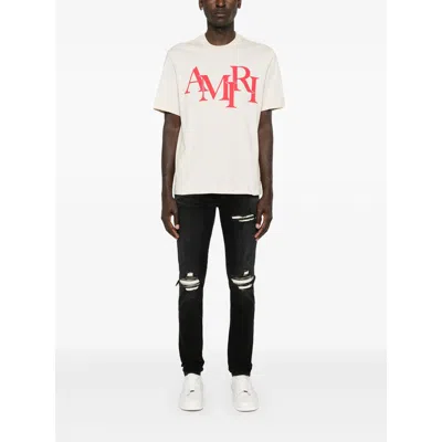 Amiri Stretch Denim Jeans Distressed Detailing In Black