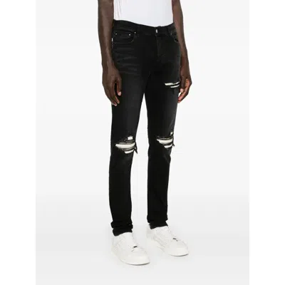 Amiri Stretch Denim Jeans Distressed Detailing In Black