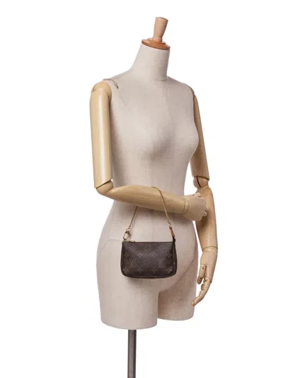 Pre-owned Louis Vuitton 2006 Monogram Mini Pochette Accessoires Handbag In Brown