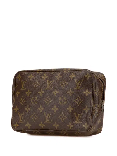 Pre-owned Louis Vuitton 1983 Monogram Trousse Toilette 23 Clutch Bag In Brown