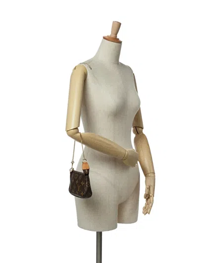 Pre-owned Louis Vuitton 2021 Monogram Mini Pochette Accessoires Handbag In Brown